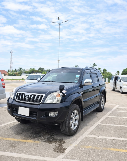 Black Toyota Prado 4x4 premium car hire Zanzibar
