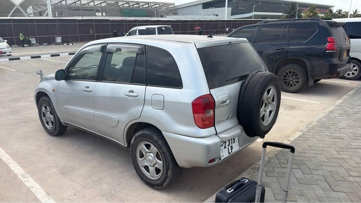 Silver Toyota RAV4 rental car at Zanzibar Airport